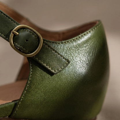 Women's Ankle Strap Mary Jane Pumps in olive green leather, close-up of the buckle